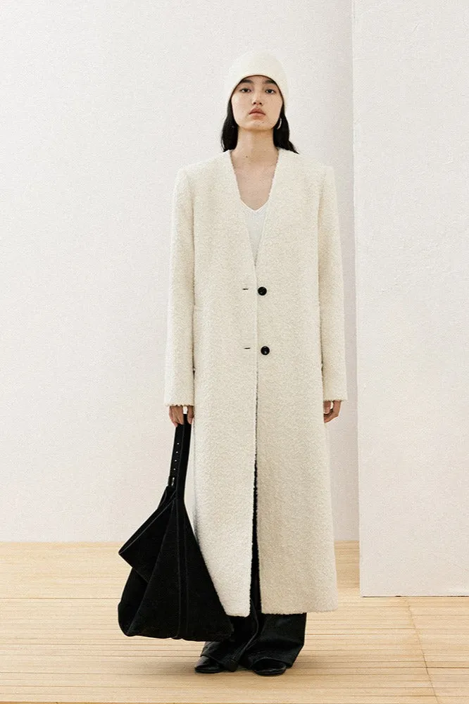 Minimalist design collarless textured coat