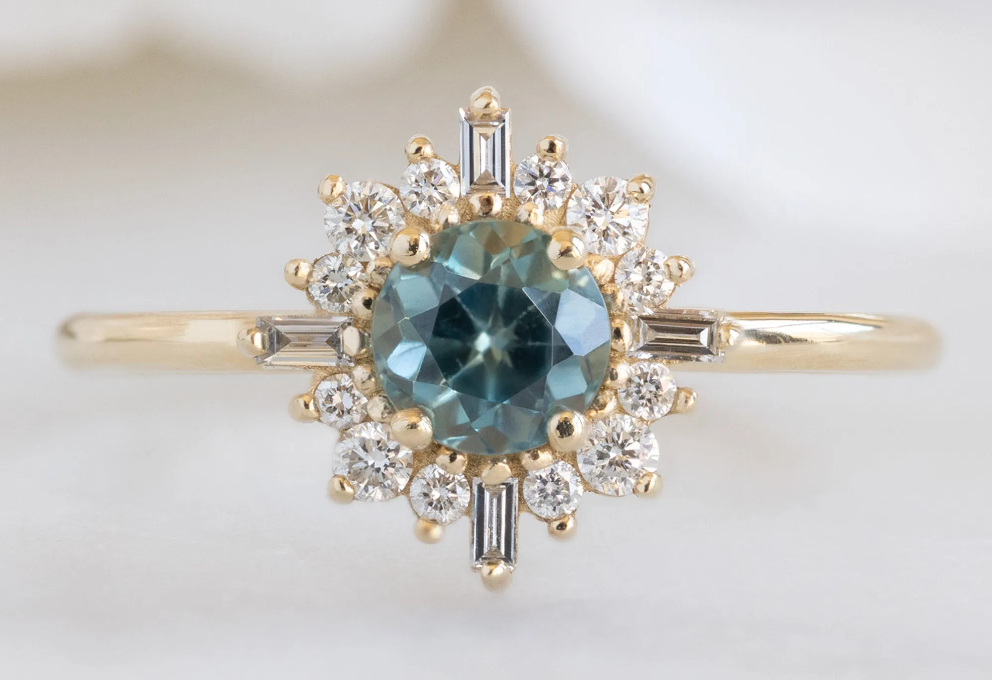 The Compass Ring with a .83ct Round Sapphire