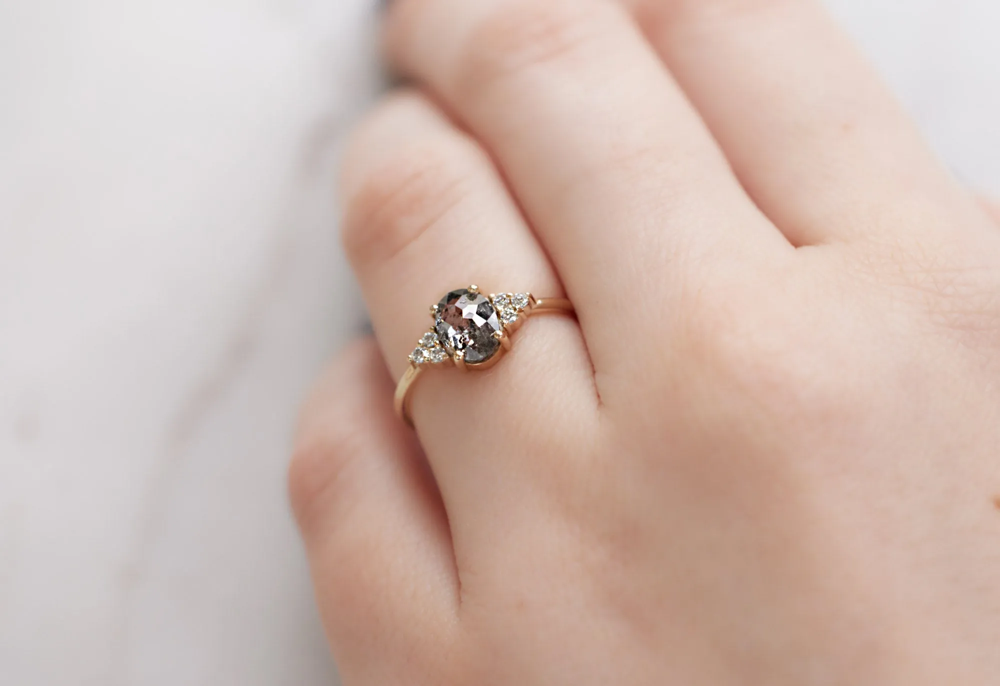 The Ivy Ring with an Oval-Cut Salt and Pepper Diamond